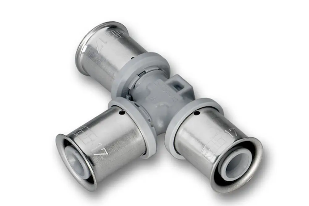 Roth T-Stück aus Metall mit drei Anschlüssen, zwei Glattflächen und einem Reduzierungsstück in der Mitte, geeignet für Heiz- und Kühlsysteme.